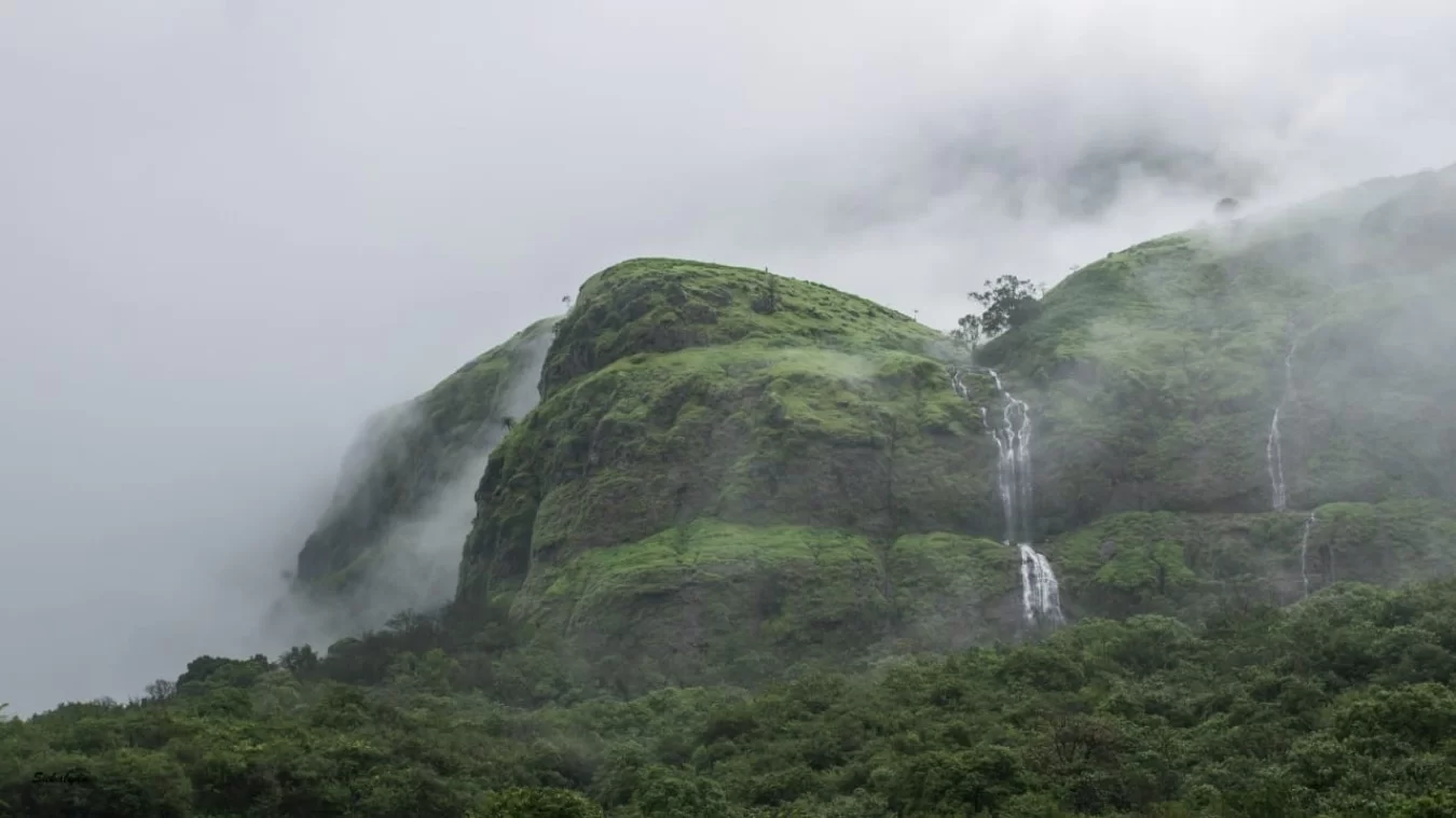 Andharban trek with clouds and waterfalls — monsoon safety